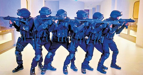 Security personnel conduct a mock drill at a hotel in Puri