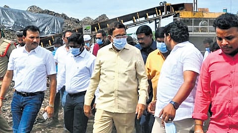 Municipal Administration and Urban Development Minister P Narayana inspects the Allipuram dumping yard in Nellore city on Sunday.
