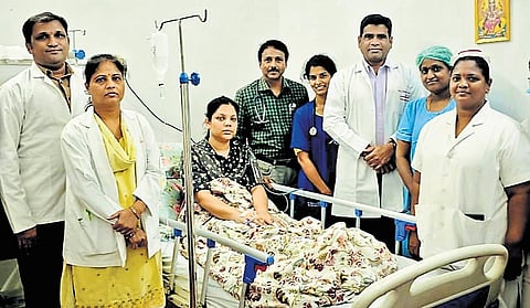 District Collector Pamela Satpathy with the team of doctors and nursing staff
at the Karimnagar Government General Hospital after surgery.