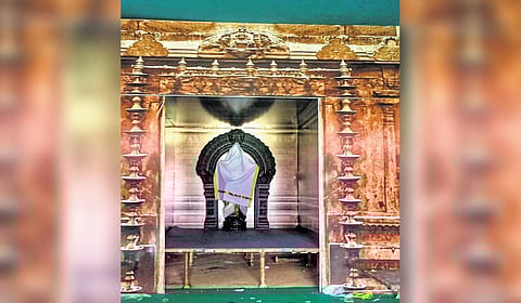 A miniature of one of Lord Murugan’s six abodes is being installed