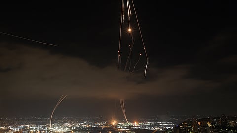Israeli air defence systems activated to intercept Iranian missiles over the Israeli city of Haifa amid a fresh barrage of Iranian rockets on June 16, 2025.