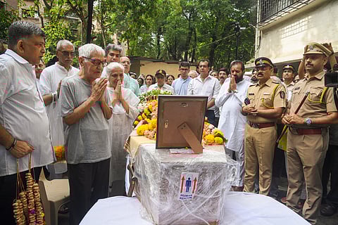 Pushkaraj Sabharwal, father of Captain Sumeet Sabharwal who was the pilot of the Air India plane which crashed in Ahmedabad last week, with others pays tribute after his son's mortal remains were brought to Mumbai for his last rites, Tuesday, June 17, 2025.