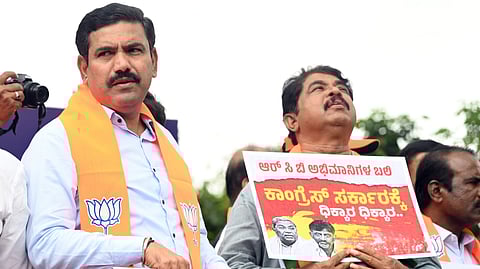 BJP leaders and workers, led by state party president BY Vijayendra and LoP R Ashoka protest, seeking the resignation of CM Siddaramaiah and DyCM DK Shivakumar over the Bengaluru stampede, on Tuesday.