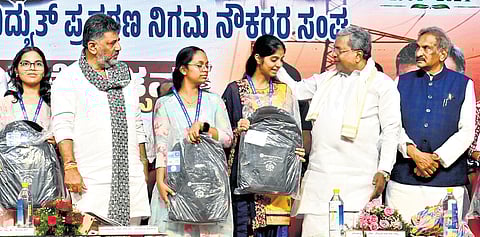 CM Siddaramaiah, DyCM DK Shivakumar and Energy Minister KJ George at the inauguration of the diamond jubilee celebrations of the Karnataka Electricity Transmission Corporation Employees’ Association in Bengaluru on Wednesday