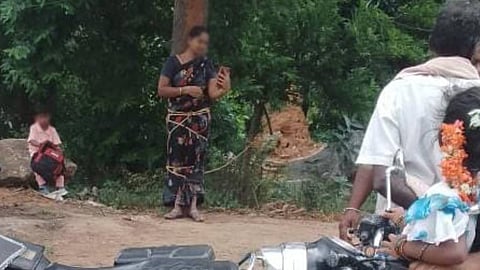 The woman was tied to a tree over a loan repayment dispute.