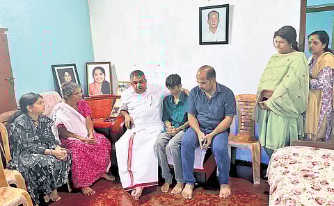 Minister Saji Cherian with Ranjitha’s family at her house in Pullad, Pathanamthitta