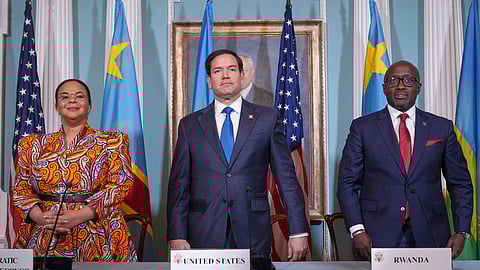 US Secretary of State Marco Rubio (C) hosts a signing ceremony in which Congo's Foreign Minister Therese Kayikwamba Wagner (L) and Rwanda's Foreign Minister Olivier Nduhungirehe (R), pledge to work toward a peace deal at the State Department in Washington, April 25, 2025.