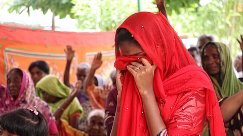 Kin of hooch tragedy victims pays perform rituals during a ceremony held on the 1st Anniversary for the Victims at Karunapuram Village in Kallakurichi district on Thursday. Pic for Krithikas story.
