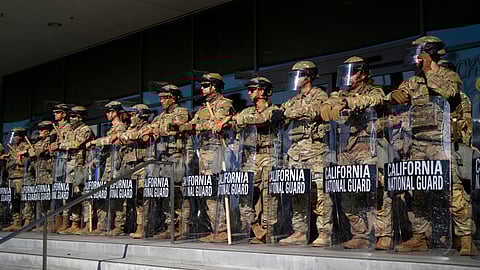 California National Guard stand in formation guarding the federal building in downtown Los Angeles on Tuesday, June 10, 2025.