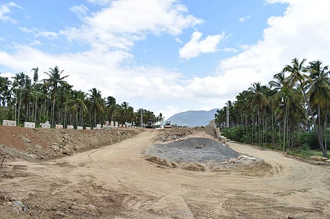 Ongoing works at the Western Ring Road near Madhampatti in Coimbatore district on Friday.