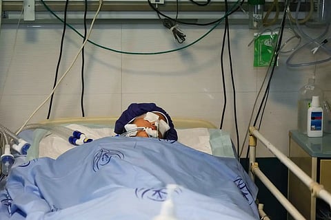 Parnia Rahmanian, 13, lies unconscious in a hospital bed following Israeli strike that targeted her neighbourhood, in Tehran, Iran, Saturday, June 21, 2025.