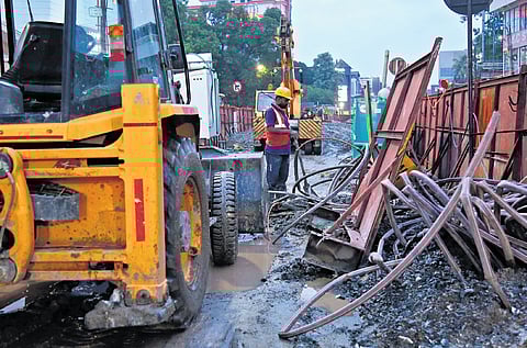 Despite intermittent rain lashing the city, work on the second phase of the Kochi Metro is progressing. A scene from Palarivattom