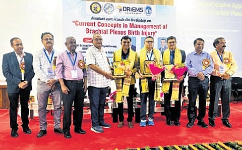Dr Maulin Shah, Dr Nischal Naik and Dr Tejas Patel being felicitated at the event