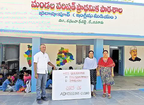 Teachers at the Mandal Parishad Primary School in Raghunathapalli mandal, Jangaon district, display an “Admission Closed” board