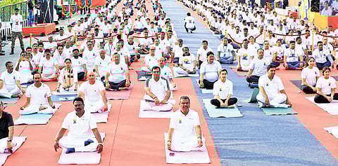 Union Minister Dharmendra Pradhan at the Yoga Day event in Sambalpur on Saturday.