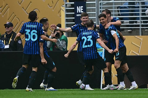 Inter Milan's Valentin Carboni (R) is congratulated by teammates after scoring his team's second goal during the FIFA Club World Cup 2025 Group E football match between Italy's Inter Milan and Japan's Urawa Red Diamonds on June 21, 2025.