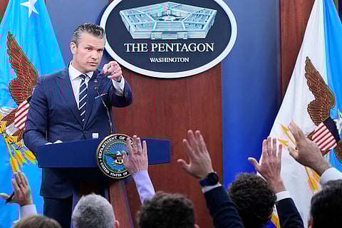 Defense Secretary Pete Hegseth calls on reporters for questions during a news conference at the Pentagon in Washington, Sunday, June 22, 2025, after the U.S. military struck three sites in Iran, directly joining Israel's effort to destroy the country's nuclear program.
