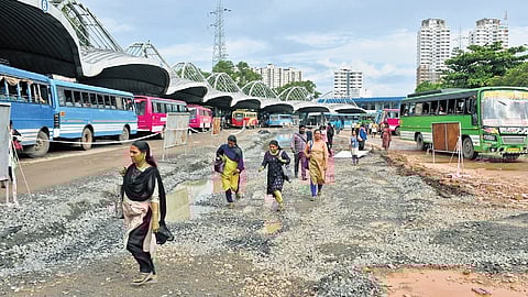 Commuters at the Vyttila Mobility Hub. TNIE had earlier highlighted the pathetic condition of the carriageway