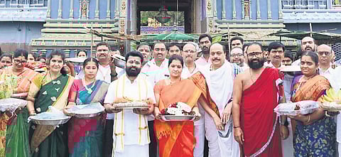 Temple Executive Officer (EO) VK Seena Naik and his wife offered the ceremonial first Saree (traditional offering) to Goddess Kanaka Durga