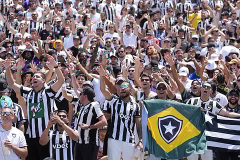 Fans of Botafogo cheer for their team after the Club World Cup Group B soccer match between Atletico Madrid and Botafogo in Pasadena, Calif., Monday, June 23, 2025.