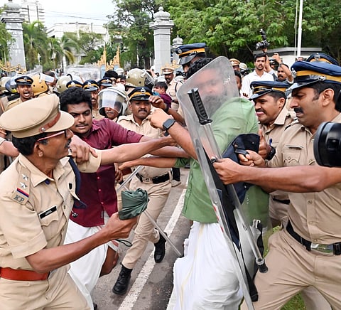 The SFI workers were protesting against the placing of Bharat Matas picture in the Hall as part of a private function attended by Governor Rajendra Arlekar.