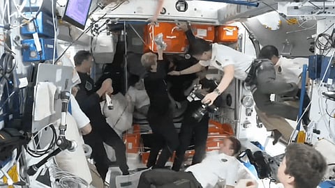 As-4 crew entering the International Space Centre.