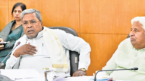 Chief Minister Siddaramaiah and Law and Parliamentary Affairs Minister HK Patil at a meeting in Bengaluru on Thursday