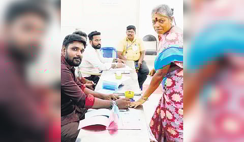A street vendor casting her vote at Tondiarpet election booth.