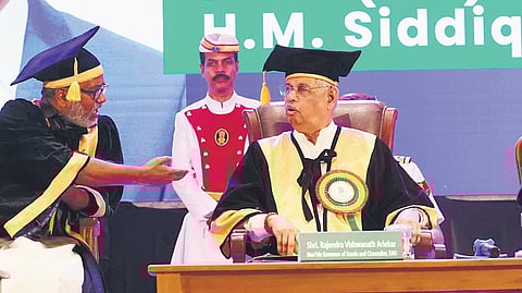 Agriculture Minister P Prasad (left) interacts with Governor Rajendra Arlekar during the convocation ceremony of Kerala Agricultural University on Thursday