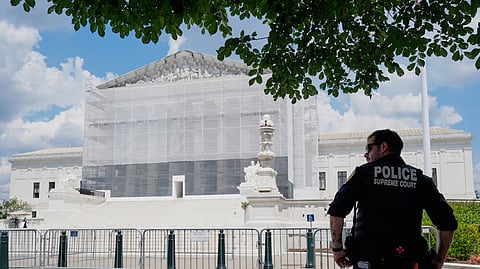 A US Supreme Court police officer stands guard outside of the Supreme Court, Thursday, June 26, 2025, in Washington.