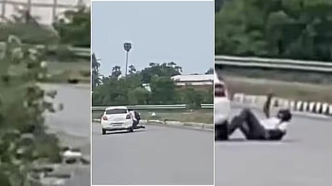 A police officer clung to a car during a high-speech chase in Tiruvallur, Tamil Nadu.