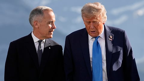 Canada's Prime Minister Mark Carney (L) and President Donald Trump