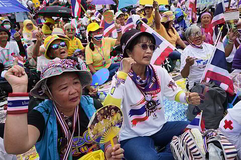 Protesters gather at Victory Monument demanding Thailand's Prime Minister Paetongtarn Shinawatra resign in Bangkok, Thailand, Saturday, June 28, 2025.