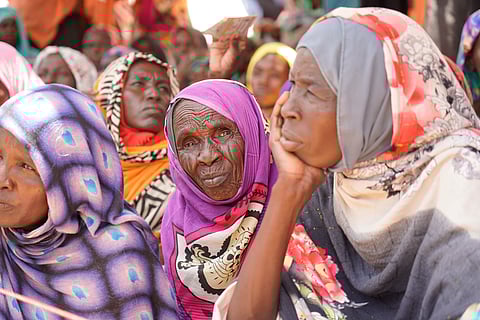 This September 2022 photo provided by the World Food Program shows internally displaced people at the ZamZam camp in El Fasher, North Darfur state, Sudan.
