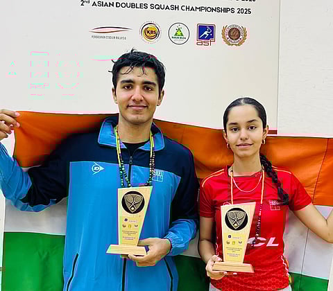Abhay Singh poses with Anahat Singh after winning the mixed doubles title in the 2nd Asian Doubles Championships on June 26