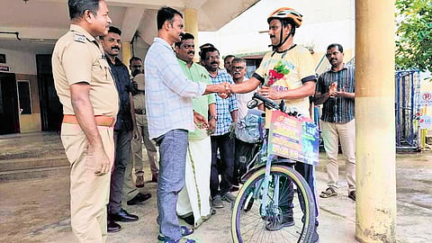 Retired SI Shahjahan receives a warm welcome at the Pathanamthitta district police headquarters.