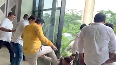 A screen grab of the assault on BMC additional commissioner Ratnakar Sahoo on the office premises.
