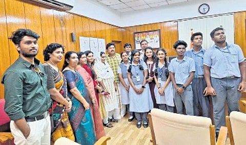 Chinmaya Vidyalaya team and Techosa officials with Minister Ganesh Kumar