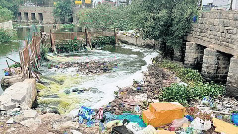 A stinky heap of garbage clogs nala near Saroornagar masjid.
