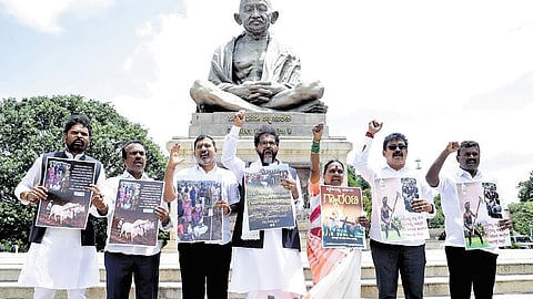 BJP leaders, including Leader of Opposition in the Legislative Council Chalavadi Narayanaswamy, protest at Vidhana Soudha on Monday.