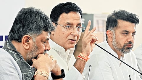 Congress general secretary Karnataka in-charge Randeep Singh Surjewala, DCM and KPCC president DK Shivakumar, and AICC secretary Abhishek Dutt address a press conference at the party office in Bengaluru on Tuesday.