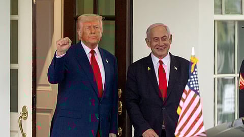 US President Donald Trump, left, stands with Israel's Prime Minister Benjamin Netanyahu at the West Wing of the White House, April 7, 2025, in Washington.