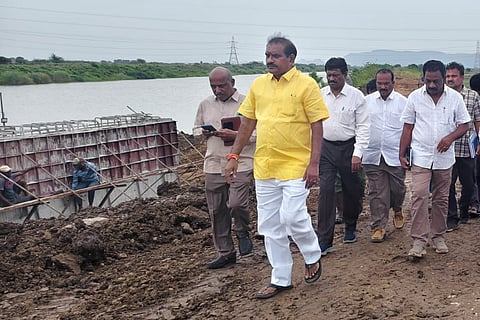Water Resources Minister Nimmala Ramanaidu announced the completion of a 365-meter-long cement concrete (CC) wall along the Budameru canal to repair three breaches caused by last year's devastating floods in Vijayawada.