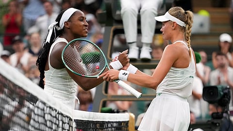 Dayana Yastremska of Ukraine shakes hands with Coco Gauff of the US, left, after winning the first round women's singles match at the Wimbledon Tennis Championships in London, Tuesday, July 1, 2025.