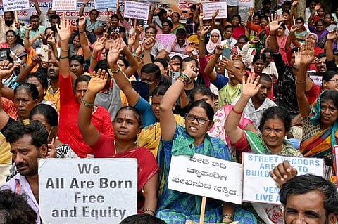 Street vendors demand to allocate a proper place for them as they have been evacuated, during their protest at Free.