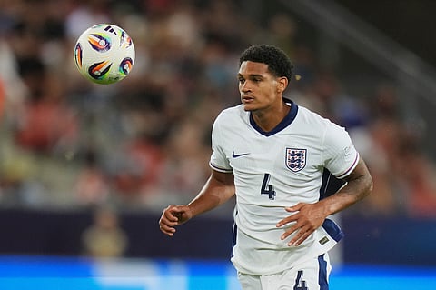 England's Jarell Quansah controls the ball during a quarter final soccer match.