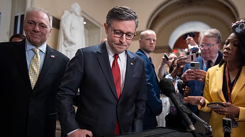 Speaker of the US House of Representatives Mike Johnson, R-La., with House Majority Leader Steve Scalise, R-La., left, walks to the chamber at the Capitol in Washington, Wednesday, July 2, 2025.