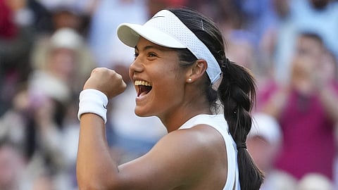 Emma Raducanu of Britain celebrates winning the second round women's singles match against Marketa Vondrousova of the Czech Republic at the Wimbledon Tennis Championships in London, Wednesday, July 2, 2025.