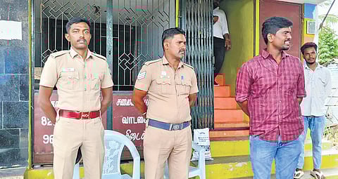 Cops standing guard at the home of key witness M Saktheeswaran.