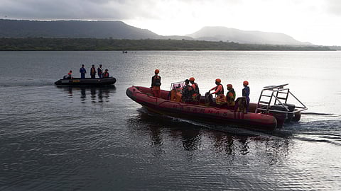 Rescuers search for victims after a ferry sank in the waters off Jembrana, Bali, Indonesia, Friday, July 4, 2025